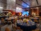 Salão de festas do Grand Hyatt Rio de Janeiro com decoração e mesas postas para a celebração de fim de ano